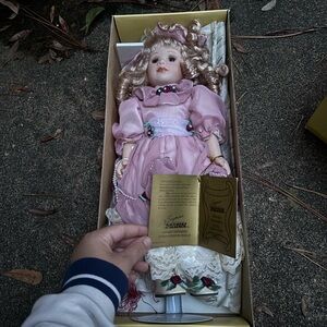 Elegant Pink Porcelain Doll with Lace Dress